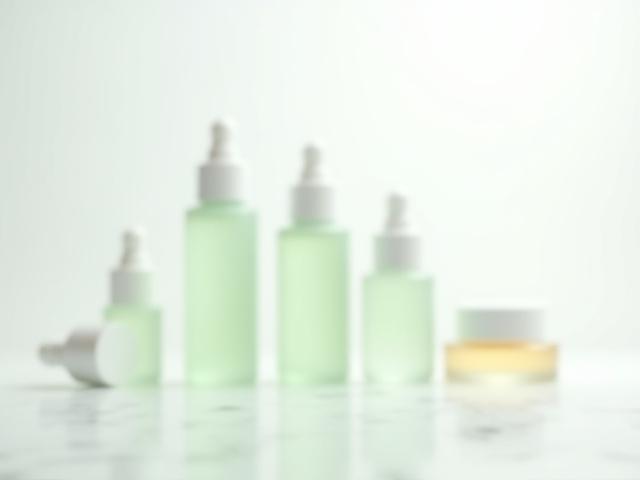 Minimalist lab-style dropper bottles on a clean surface